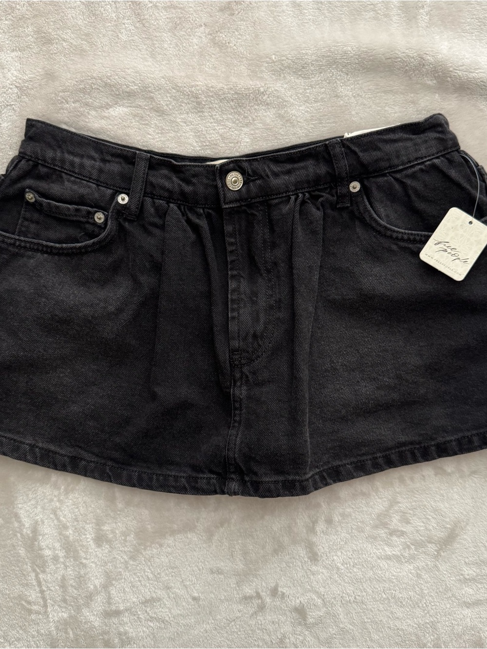 We The Free by Free People pleated micro mini denim skort in black, size 28.